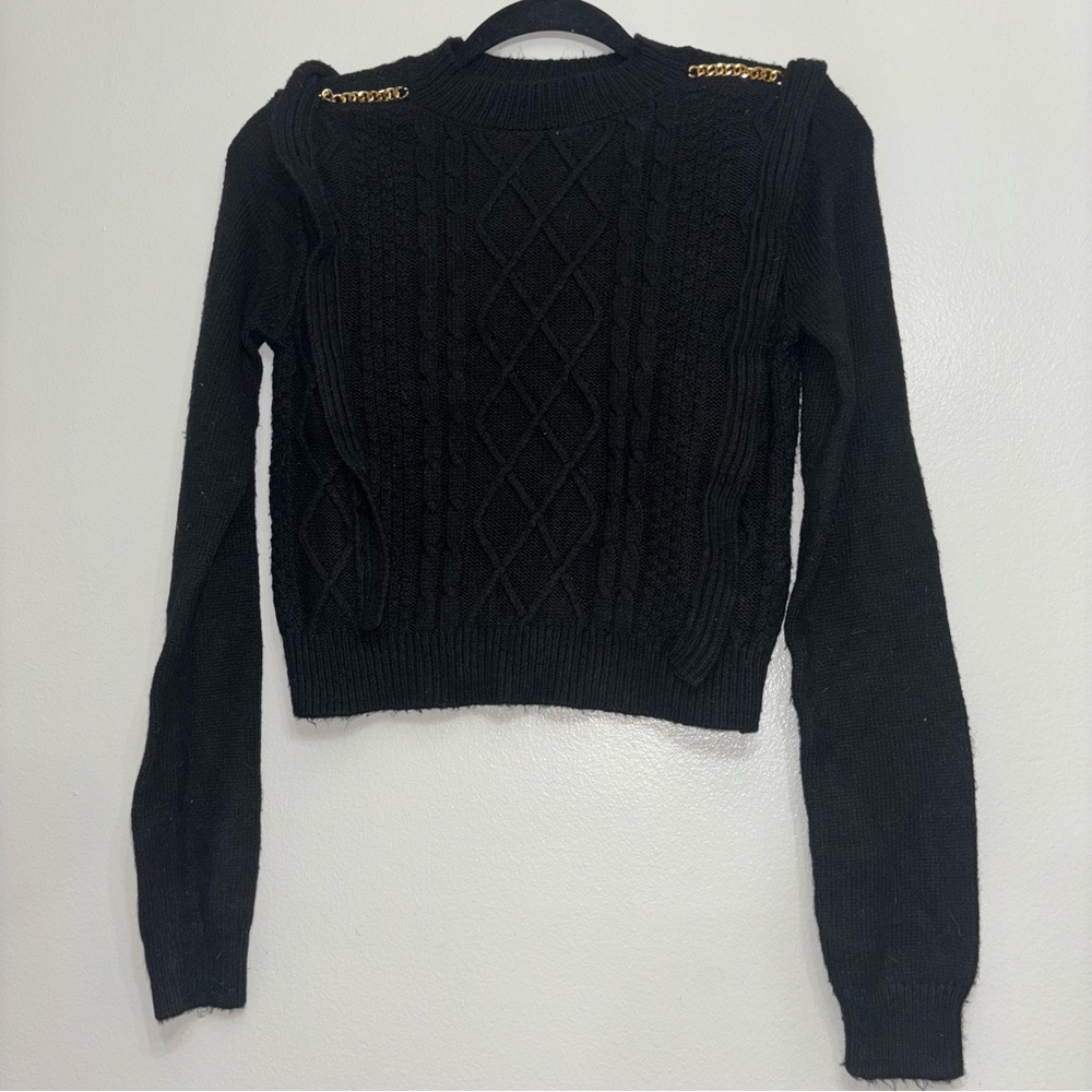 Black Sweater with Gold Accents